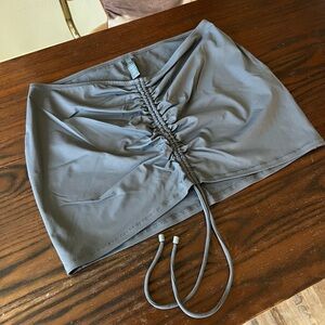 SKIMS Swim Ruched Mini Skirt in Gunmetal Dark Grey Color Recycled